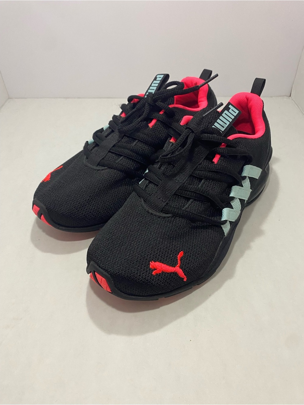 Puma Kids Black Sneakers with Coral Accents